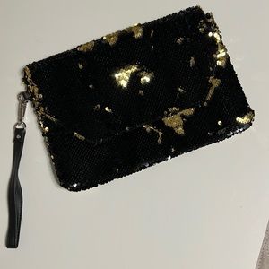 Black and gold envelope clutch with strap